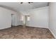 Open-concept living area featuring modern tile flooring, neutral walls, and airy design at 6356 Sleepy Hollow Dr, Orlando, FL 32810