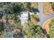 High angle view showcases the homes backyard and nearby pool at 6408 Ridge Ter, Orlando, FL 32810
