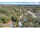 Scenic aerial view showcasing the neighborhood with a nearby lake at 6408 Ridge Ter, Orlando, FL 32810