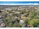 Scenic aerial view showcases homes nestled amongst lush trees at 6408 Ridge Ter, Orlando, FL 32810