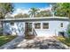 The backyard features a large patio area and sliding door access to the home's interior at 6408 Ridge Ter, Orlando, FL 32810