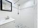 Bathroom features include a sleek vanity and walk-in shower with stylish white subway tile at 6408 Ridge Ter, Orlando, FL 32810