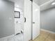 Bathroom with a sliding barn door, updated vanity and shower at 6408 Ridge Ter, Orlando, FL 32810