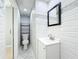 Bathroom features include a modern vanity, stylish subway tile and a separate toilet space at 6408 Ridge Ter, Orlando, FL 32810