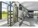 Fitness center with various equipment and natural light, promoting a healthy lifestyle at 6895 Botanic Blvd, Harmony, FL 34773