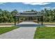 Inviting community gazebo with wooden deck, perfect for relaxation and social gatherings in a lush outdoor setting at 6895 Botanic Blvd, Harmony, FL 34773