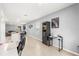 Living room with tile flooring, modern decor, and comfortable seating area at 6895 Botanic Blvd, Harmony, FL 34773