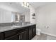 Bathroom featuring dual sinks, granite countertops, and ample space for personal care at 9862 Pecan Hickory Way, Orlando, FL 32832