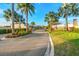 The grand gated entrance of the Lake Emma Sound community features lush landscaping and a welcoming atmosphere at 1208 Patterson Ter, Lake Mary, FL 32746