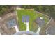 Aerial view of a well-maintained home with a lush green yard at 16074 Sw 49Th Court Rd, Ocala, FL 34473