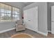 Bedroom with new flooring, a chair, natural light, and closet at 1660 5 Ave, Deland, FL 32724