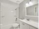 A clean, standard bathroom with a shower-tub combo, toilet, and vanity at 176 Balfour Dr # 4, Winter Park, FL 32792