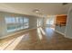 Bright living room with an open concept layout featuring tile floors and a view of the pool at 1926 Binnacle St, Kissimmee, FL 34744