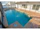 Amazing private pool in screened lanai featuring brick pavers, fountains, and sparkling water at 1926 Binnacle St, Kissimmee, FL 34744