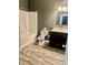 Well-lit bathroom with a tub and a modern vanity at 2000 Erving Cir # 201, Ocoee, FL 34761