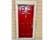 Close-up of the bright red front door with white trim and unit number 6-201 at 2000 Erving Cir # 201, Ocoee, FL 34761