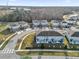 Aerial view of neighborhood featuring well-maintained homes and manicured lawns at 2788 Pleasant Cypress Cir, Kissimmee, FL 34741