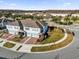 Stunning aerial view showcasing this townhome's prime location and meticulously landscaped surroundings within a gated community at 2788 Pleasant Cypress Cir, Kissimmee, FL 34741