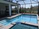 Pool with a connected spa, screened in with extended lanai at 2800 Simile St, Kissimmee, FL 34746