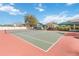 Enjoy an active lifestyle with this well-maintained tennis court and nearby playground in the community at 2929 University Acres Dr, Orlando, FL 32817