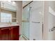 Comfortable bathroom featuring a shower with white subway tiles and a golden framed glass door at 3668 Peppervine Dr, Orlando, FL 32828