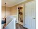 Bright upstairs hallway bathroom featuring a clean white door and trim at 3668 Peppervine Dr, Orlando, FL 32828