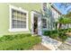 Charming two-story townhome with well-manicured landscaping and a bright entryway at 3668 Peppervine Dr, Orlando, FL 32828