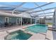 Relaxing pool and spa area with covered patio and ample space for outdoor dining and lounging at 38 Lakeview Reserve Blvd, Winter Garden, FL 34787