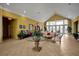 Bright community lobby with seating, plants and information for residents at 4004 San Gallo Dr # 107, Kissimmee, FL 34741