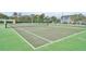 Outdoor tennis court available to residents with well maintained net and painted lines at 4004 San Gallo Dr # 107, Kissimmee, FL 34741