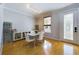 Dining room with hardwood floors, modern lighting, and stylish furnishings at 4464 Cleary Way, Orlando, FL 32828