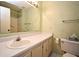 Bright bathroom featuring a toilet, sink and a shower at 536 Orange Dr # 16, Altamonte Springs, FL 32701