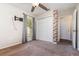 Bedroom with a ceiling fan, window, closet and stylish brick pillar at 610 Carolina Ave, St Cloud, FL 34769