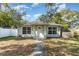 Charming single-story home with a well-maintained lawn and inviting front entrance at 610 Carolina Ave, St Cloud, FL 34769