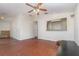 An airy living room with wood floors, a neutral palette, and abundant natural light at 610 Carolina Ave, St Cloud, FL 34769