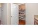 Walk-in pantry with white shelving at 610 Carolina Ave, St Cloud, FL 34769