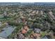 Aerial view of community with beautiful landscaping near Universal Studios theme park at 7532 Bay Port Rd # 18, Orlando, FL 32819