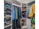 Organized walk-in closet with shelves, hanging rods, and plenty of storage space at 7532 Bay Port Rd # 18, Orlando, FL 32819