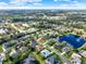 Community aerial view showcasing the neighborhood, surrounding lakes, and mature trees at 795 Sterling Chase Dr, Port Orange, FL 32128