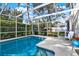 Enclosed pool and deck area featuring a covered lanai for outdoor enjoyment and relaxation at 795 Sterling Chase Dr, Port Orange, FL 32128