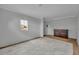 Bedroom with marble tile flooring, a small window, and a wooden dresser at 807 Vercelli St, Deltona, FL 32725