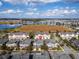 Real estate aerial view of a neighborhood with lake view, showing location of a beautiful townhome at 8163 Upper Perse Cir, Orlando, FL 32827