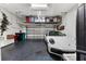 Well-organized garage with overhead storage, and space for parking at 8163 Upper Perse Cir, Orlando, FL 32827