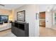 Inviting entryway with neutral walls and a view into the living room and kitchen, offering a glimpse of home life at 8413 Commander Cv, Winter Park, FL 32792