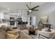 Spacious living room showcases the open floor plan with the kitchen in the background at 8523 Fort Clinch Ave, Orlando, FL 32822