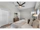 Relaxing main bedroom features vaulted ceiling, a ceiling fan, and neutral decor at 8523 Fort Clinch Ave, Orlando, FL 32822