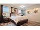 Serene main bedroom with tray ceilings, contemporary decor, and natural light, creating a peaceful retreat at 9360 Meadow Hunt Way, Winter Garden, FL 34787