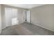 Bedroom with gray walls and carpet and closet at 1030 Plantation Dr # C6, Kissimmee, FL 34741