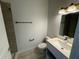 Bathroom vanity sink, modern fixtures, toilet and shower at 1213 S Station Pl # 404, Orlando, FL 32827