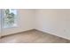 Inviting bedroom with ample natural light and new flooring at 1213 S Station Pl # 404, Orlando, FL 32809